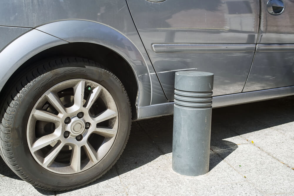 Why are are bollards required by code sometimes?