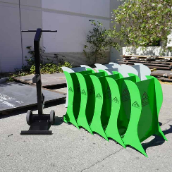 A picture of the DSC50 S Barrier, next to the included transporter dolly, which makes set up time easy and fast