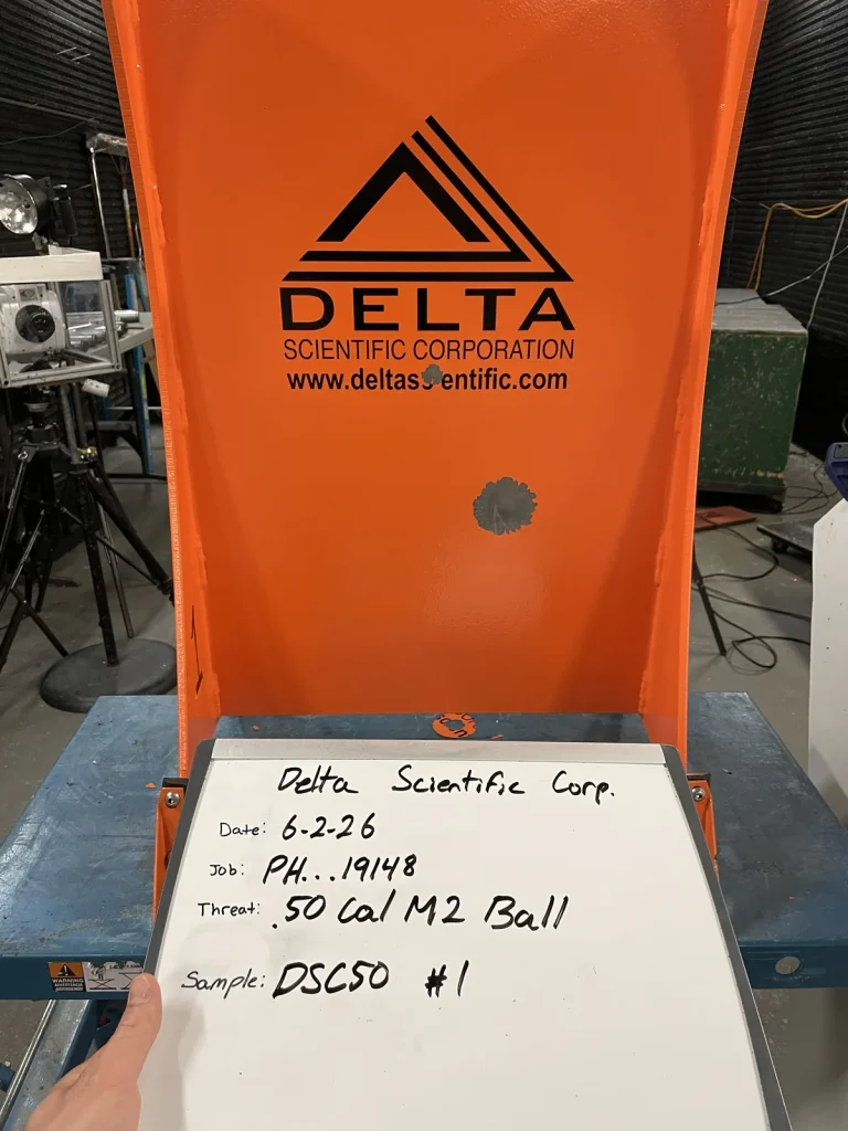 A picture of the DSC50 mobile vehicle barrier with bullet markings, demonstrating its bullet resistance features.